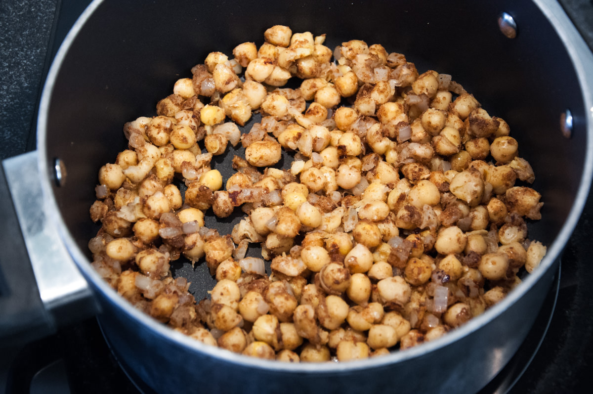 spiced chickpeas and onions in pot