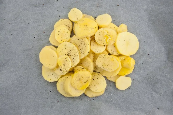 Baked Potato Slices on parchment paper