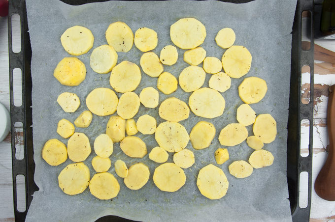 Baked Potato Slices on parchment paper