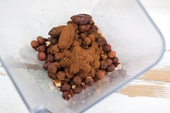 hazelnuts, dates, and cocoa powder in blender