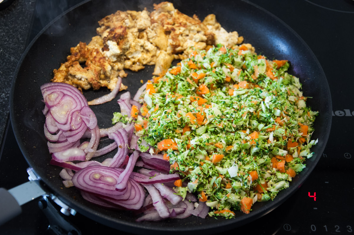 vegan egg, veggies and onion in pan