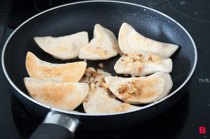 pan-frying vegan pierogi