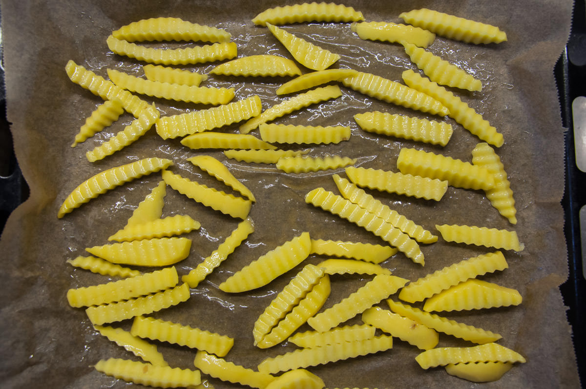 Crinkle Cut Fries before baking on baking tray