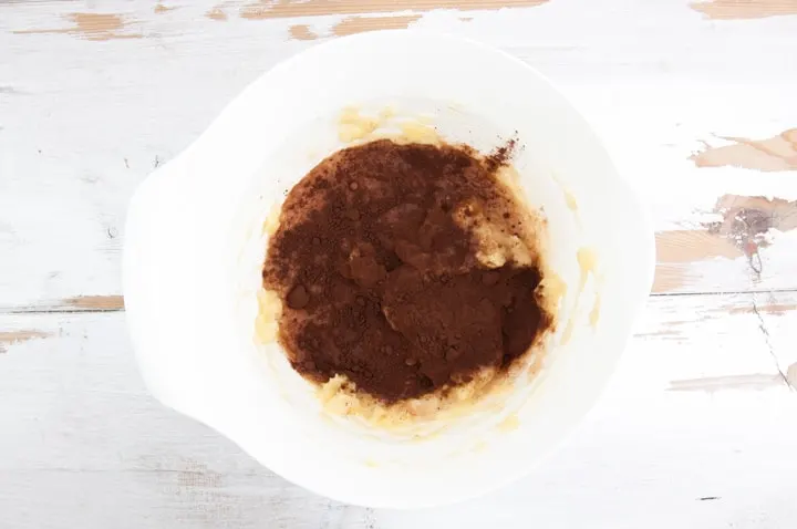 mashed bananas, cocoa powder and almond milk in a bowl