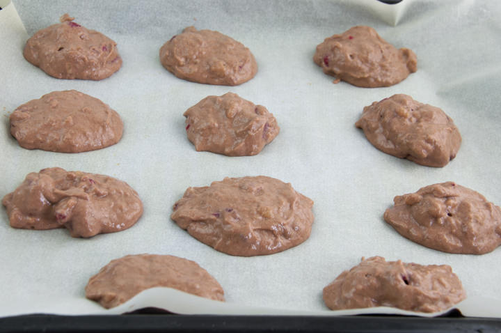 Sugar-Free Chocolate Cookies with Raspberries before baking on a baking tray