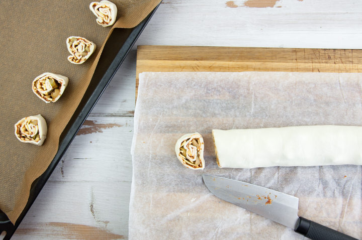 cutting pizza pinwheels in slices