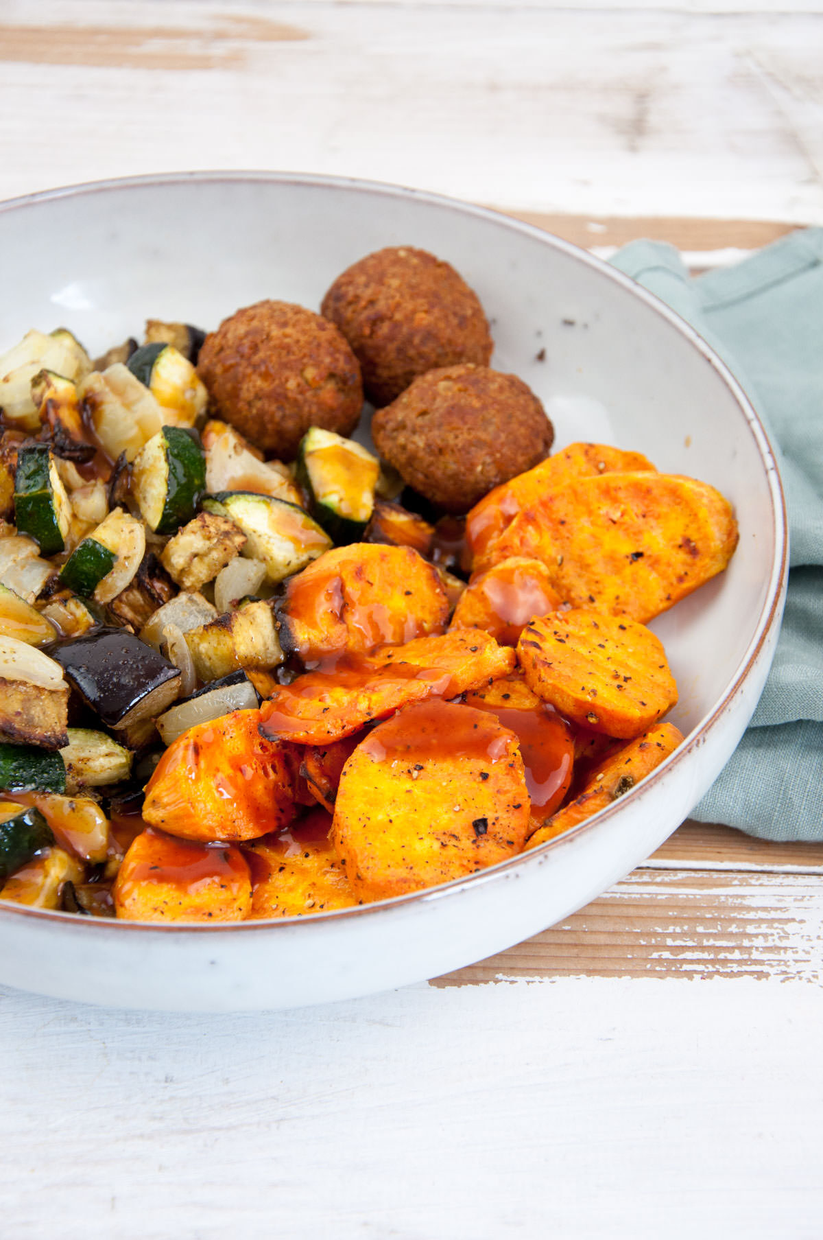 Oven-Baked Sweet Potato Slices with roasted veggies and falafel