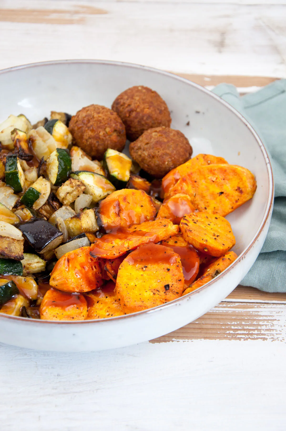 Oven-Baked Sweet Potato Slices with roasted veggies and falafel