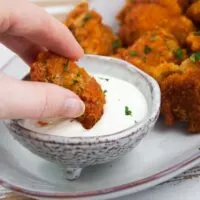 spicy cauliflower wings dipped in mayo