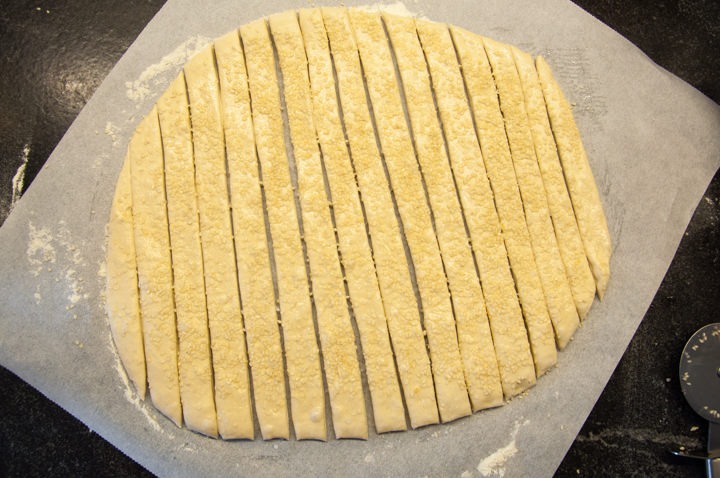 cut dough with sesame seeds