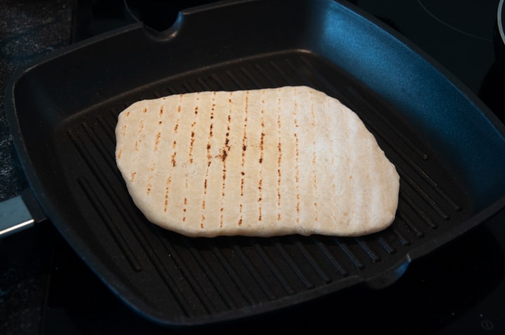 grilled flatbread in a pan