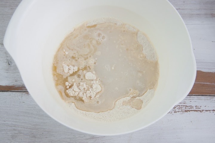 ingredients for lemon muffins in a bowl