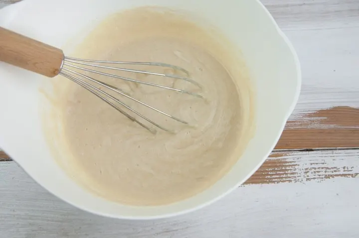 lemon muffin batter in a bowl