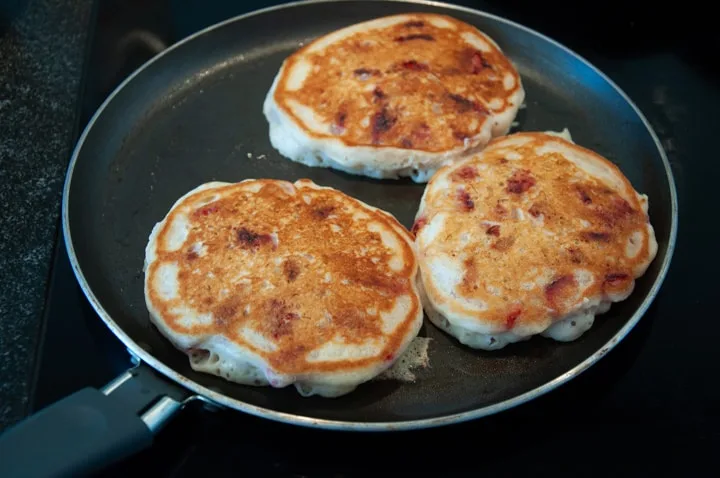 strawberry pancakes in pan