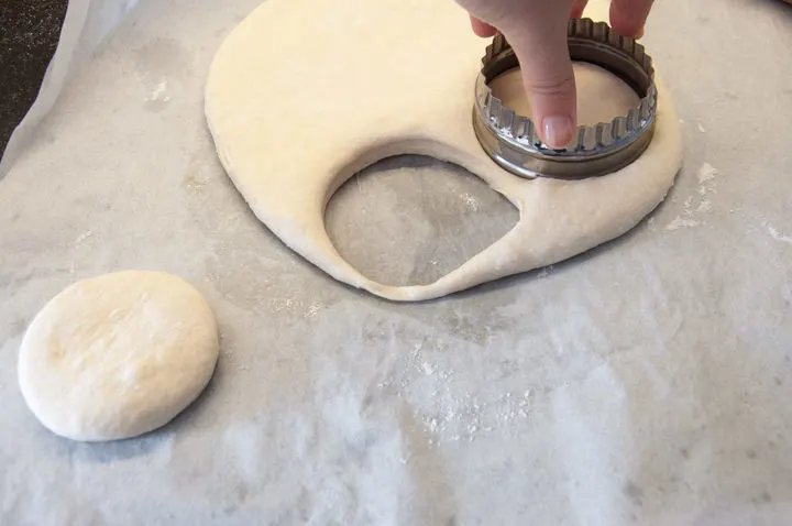 cutting out english muffins