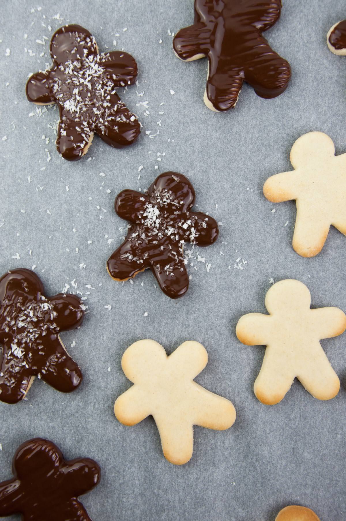 almond butter sugar cookies with chocolate coating and shredded coconut