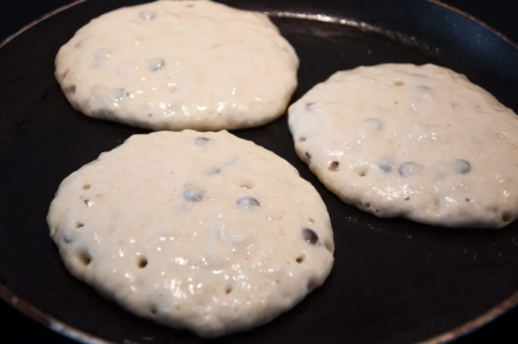 chocolate chip pancakes in pan