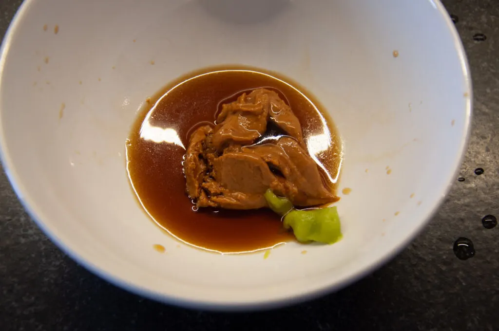 peanut butter, soy sauce and wasabi in bowl