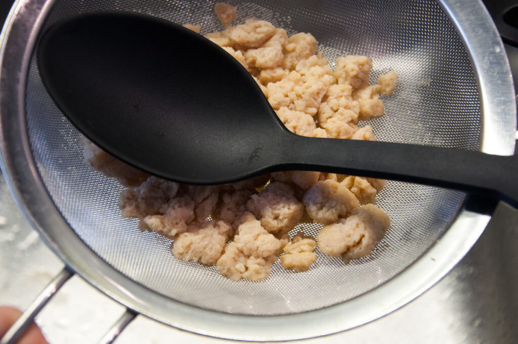 pressing out soya chunks