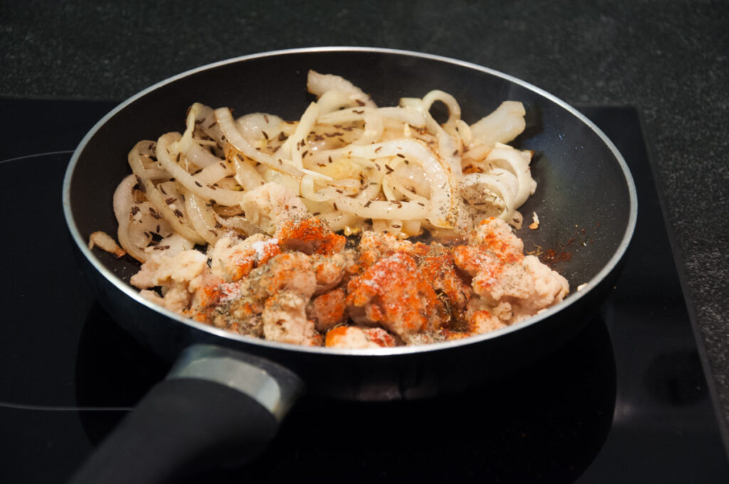 onion, garlic, spices, soya chunks in pan