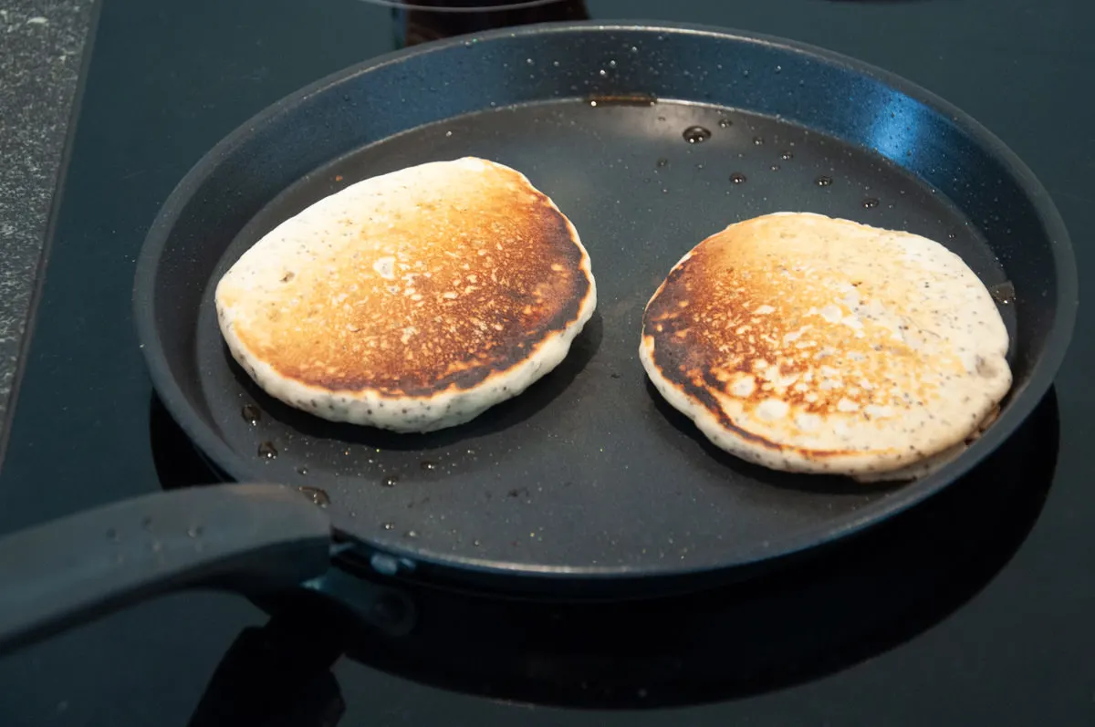 lemon poppy seed pancakes in pan