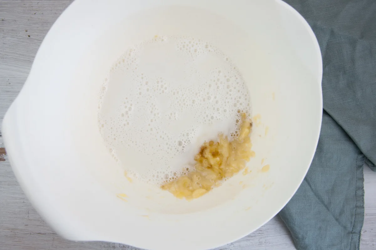 mashed banana, lite coconut milk, and maple syrup in bowl