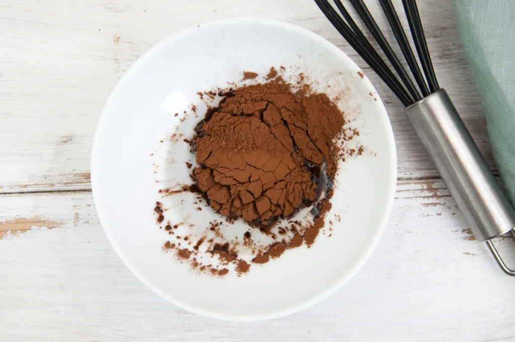 oil and cocoa powder in bowl