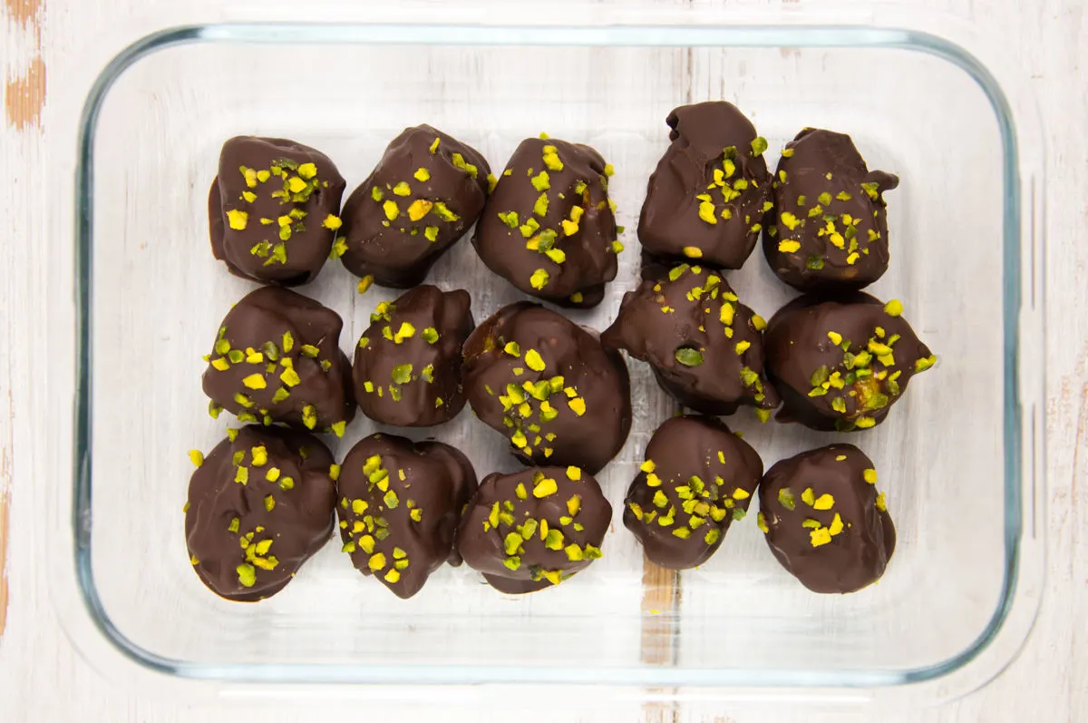 pistachio butter stuffed dates covered with chocolate