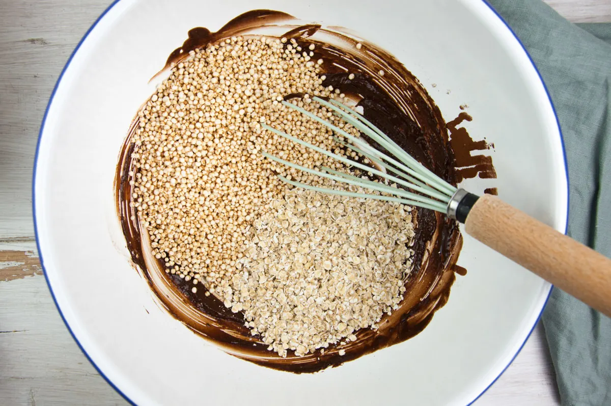 puffed quinoa and rolled oats in chocolate peanut butter sauce