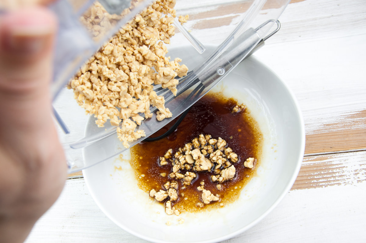 adding tempeh crumbs to marinade