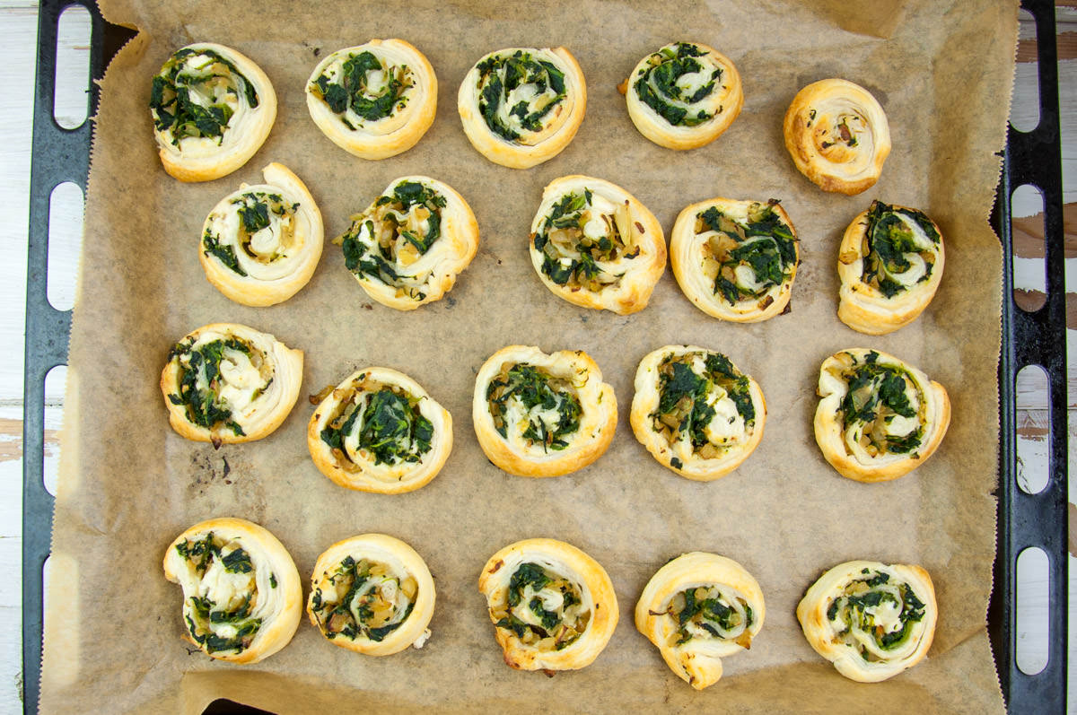 Vegan Spinach Pinwheels on a baking tray