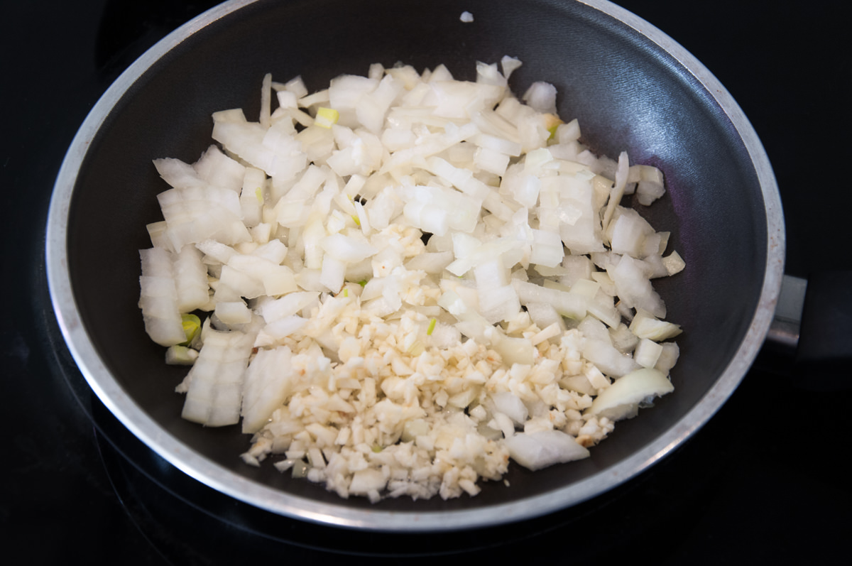 onion and garlic in pan