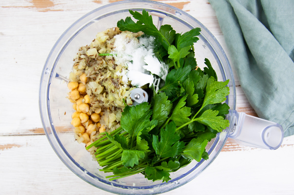 chickpeas, parsley, onion, garlic, cumin, baking soda, salt in food processor