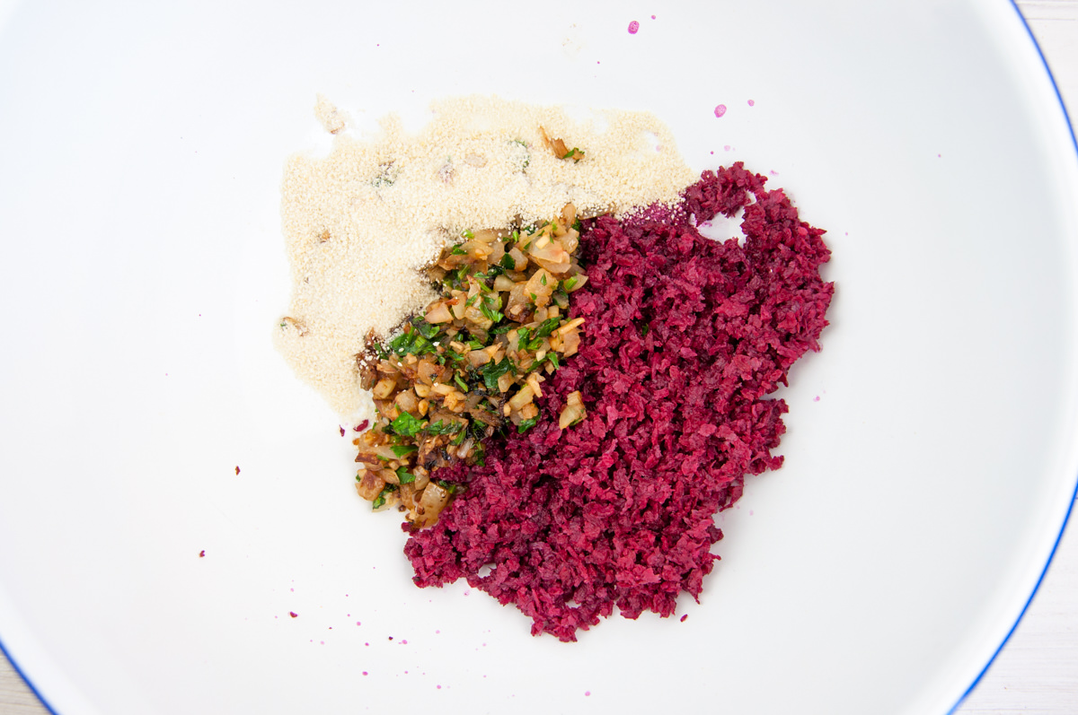 beet juice tvp, garlic, onion, parsley and breadcrumbs in bowl