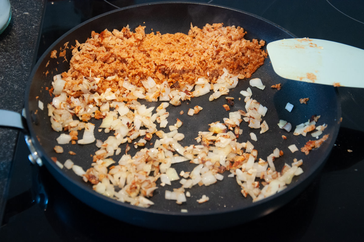 soy granule, onions and garlic in pan