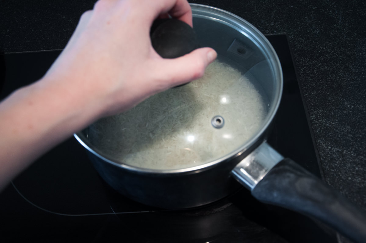 Cook the rice with a lid